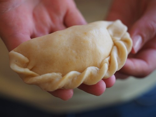 Crimping and sealing empanadas