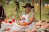 One of the women with her prize winning potatoes