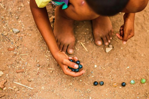 Matacuca, a popular marbles game in Bolivia