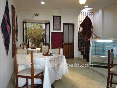 Entry dining area next to the travel agency