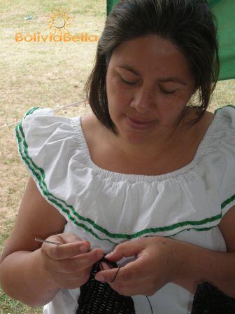 This woman is wearing a typical traditional cruceño dress.
